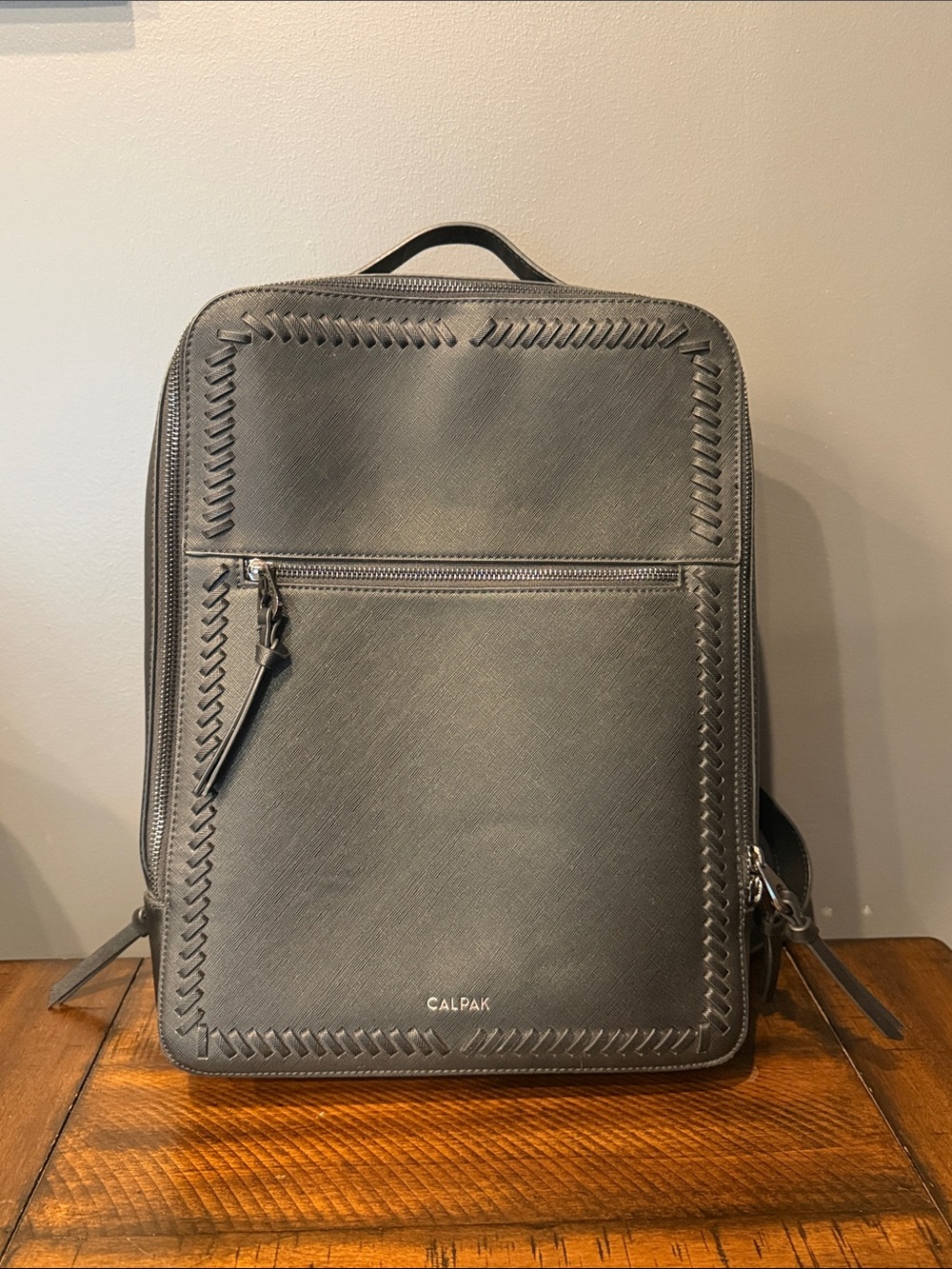 Calpak Black Leather Backpack with Woven-Edge Detail